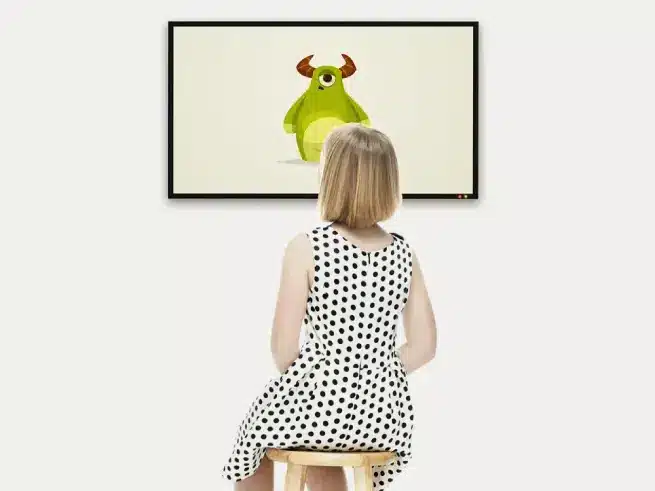 Girl looking at wall art - Pediatric Audiometry by Pure Tone Diagnostics LLC